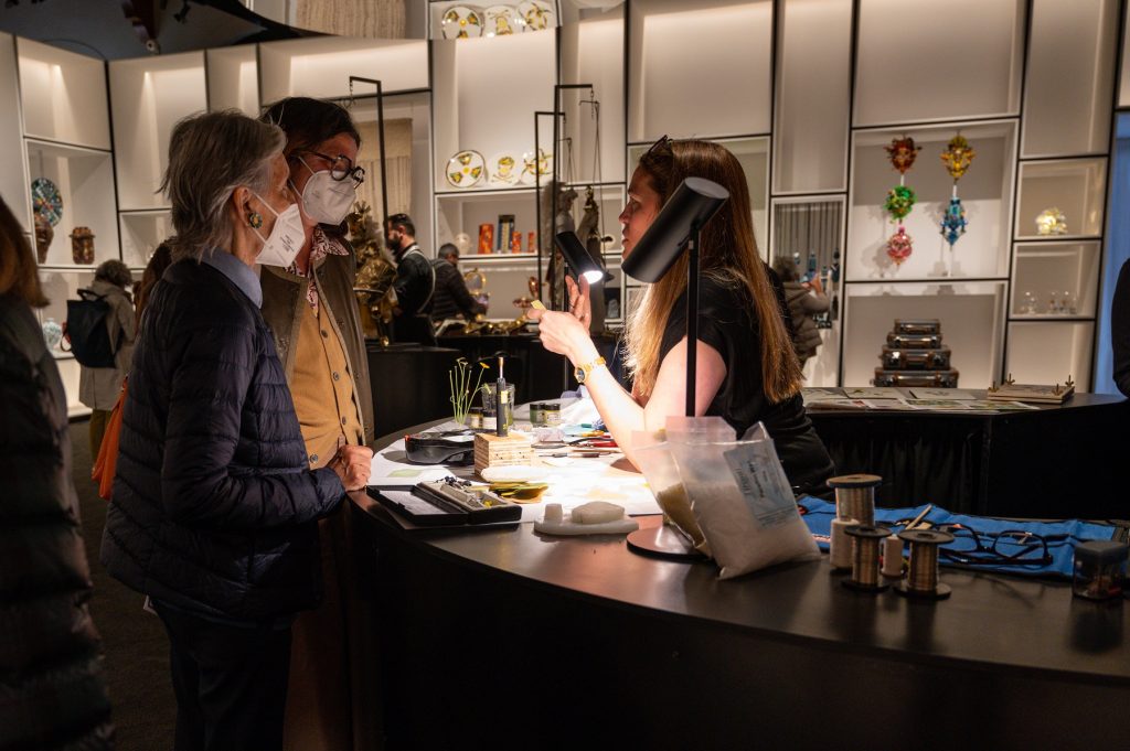 Annette Marie Townsend demonstrating wax botanical sculpting techniques to visitors at Homo Faber 2022.