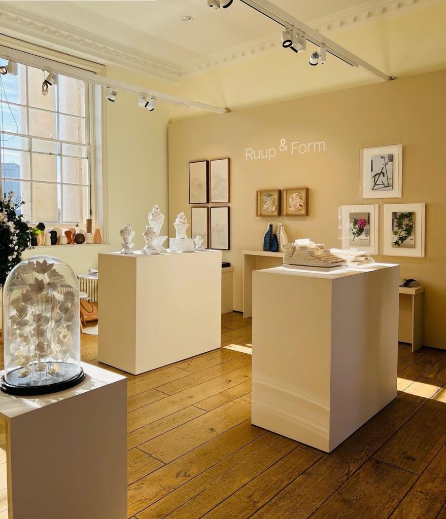Installation view of Ruup & Form's Memories Live Here exhibition at Collect 2022, Somerset House, showing the gallery presentation with works from the Aliens series displayed alongside contemporary craft and sculpture.