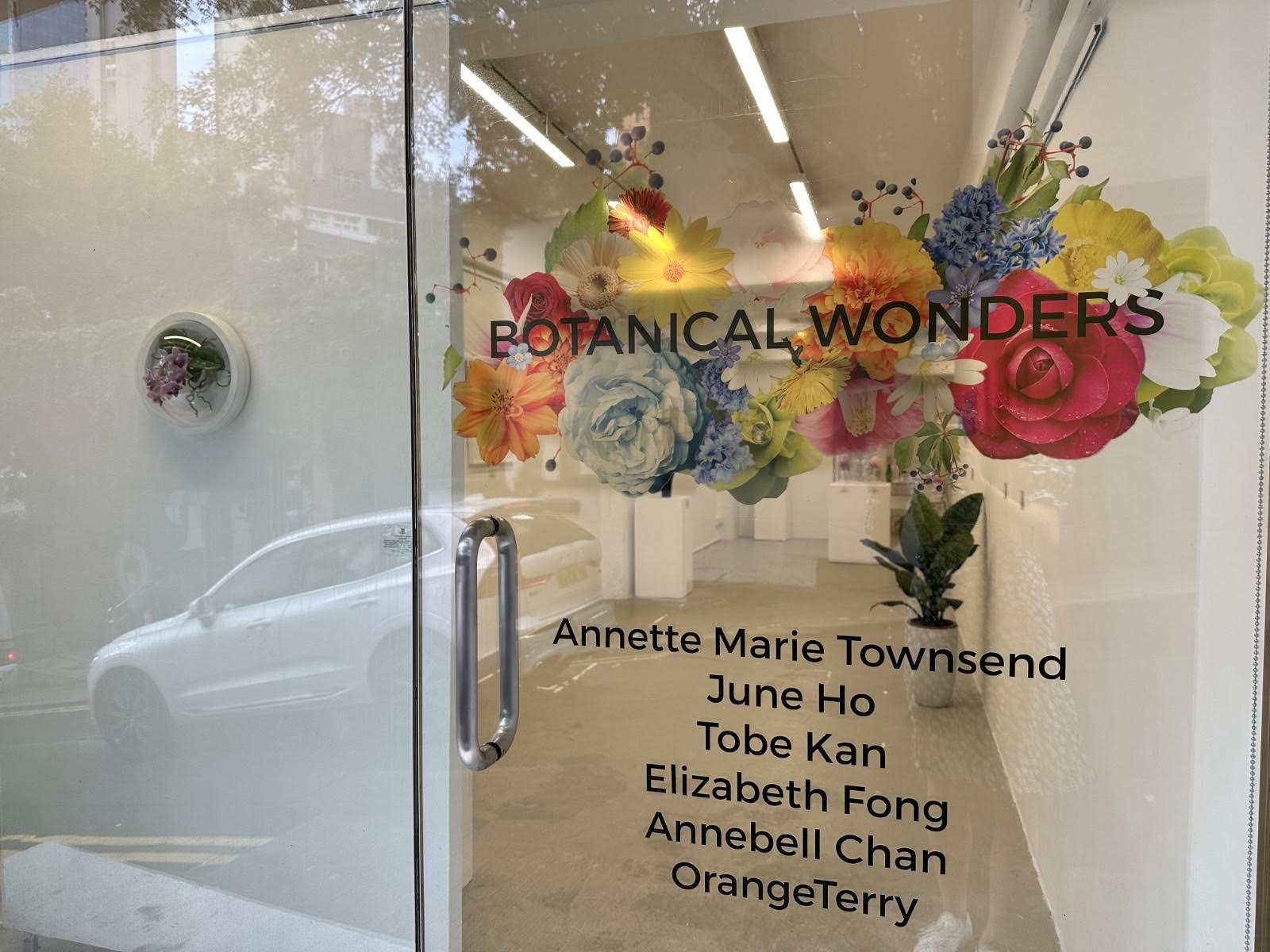 Annette's name printed on the glass door entrance to the Botanical Wonders show at Karin Weber Gallery Hong Kong