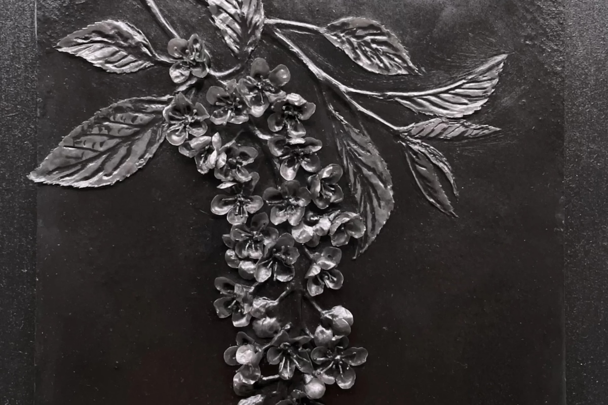 Close-up detail of wax bird cherry sculpture from Flight of the Bumblebees Black Series